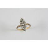 AN EARLY 20TH CENTURY DIAMOND MARQUISE-SHAPED RING millegrain set with graduated old-cut diamonds in