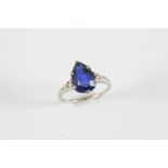 A SYNTHETIC SAPPHIRE PEAR-SHAPED RING the synthetic pear-shaped sapphire is set in white gold.