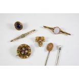A VICTORIAN GOLD AND GEM SET HEART AND SCROLL BROOCH together with a Victorian garnet, chrysoberyl