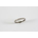 A DIAMOND FULL CIRCLE ETERNITY RING millegrain set with single-cut diamonds in engraved mount.