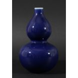 CHINESE MONOCHROME BLUE DOUBLE GOURD VASE, shading to white at the neck and foot, height 18cm