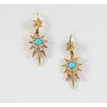 A PAIR OF TURQUOISE AND DIAMOND SET DROP EARRINGS of star design, each centred with a circular
