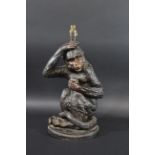 LARGE POTTERY TABLE LAMP - LAMP a large table lamp in the form of a Monkey, with a oval plinth and