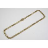 A 9CT GOLD FLAT CURB LINK NECKLACE formed with long and short curb links to a concealed clasp,