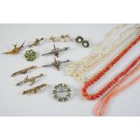 A QUANTITY OF JEWELLERY including two single row cultured pearl necklaces, a green enamel, pearl and