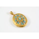 A VICTORIAN GOLD, TURQUOISE AND PEARL SET LOCKET of oval shape, mounted to the front with a star