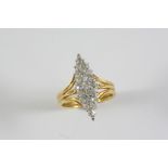 A DIAMOND MARQUISE SHAPED CLUSTER RING set with graduated circular-cut diamonds in 18ct gold. Size