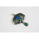 AN ART NOUVEAU ENAMEL AND SILVER PENDANT BY MURRLE BENNETT & CO the silver foliate mount is