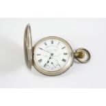 A SILVER HALF HUNTING CASED POCKET WATCH the white enamel dial signed Cooke & Kelvey, Calcutta,