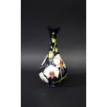 MOORCROFT VASE - CHATSWORTH ORCHID a boxed modern limited edition Moorcroft vase in the Chatsworth