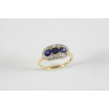 A LATE VICTORIAN SAPPHIRE AND DIAMOND TRIPLE CLUSTER RING the three circular-cut sapphires are set