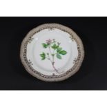 ROYAL COPENHAGEN - FLORA DANICA the plate painted with flowers and foliage, and with a gilded and
