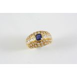 A SAPPHIRE AND DIAMOND RING the octagonal-shaped sapphire is set within a surround of rectangular-