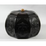 CHINESE OCTAGONAL HARDWOOD BOX AND COVER, each panel carved with an auspicious symbol from Buddhism,