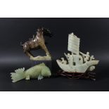 CHINESE TANG STYLE JADE HORSE, in mottle grey and brown, leaning back on its haunches, height