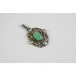 AN ARTS AND CRAFTS CHRYSOPRASE AND SILVER PENDANT the openwork foliate silver mount is set with an