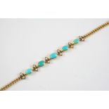 A GOLD, TURQUOISE AND PEARL SET BRACELET formed with five graduated oval turquoise cabochons