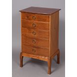 OLIVER MOREL (1916-2003) - COTSWOLD SCHOOL CHEST OF DRAWERS, 1972 a narrow mahogany bow front