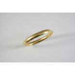 AN 18CT GOLD HALF HINGED BANGLE 18.0 grams, internal measurements 5 x 6cm