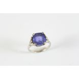 AN ART DECO SAPPHIRE AND DIAMOND RING the cushion-cut sapphire weighs approximately 5.8 carats and