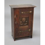 ARTS & CRAFTS WALL CABINET - SHAPLAND & PETTER an oak cupboard with a central copper panel with