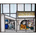 ARTS & CRAFTS STAIN GLASS PANEL a pictorial stain glass panel with depictions of Medieval figures,