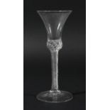 GEORGIAN WINE GLASS, the bell bowl on a multiple air twist stem extending into the base of the bowl,