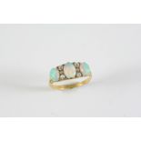 A VICTORIAN OPAL AND DIAMOND RING the three graduated oval solid white opals are millegrain set with