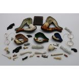 A MIXED LOT:- Five various Meerschaum pipes in fitted cases, a tortoiseshell card case and a