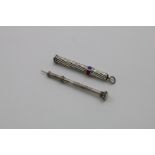 A RARE VICTORIAN COLUMN-TYPE PENCIL with engine-turned decoration, the terminal set with the