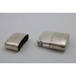 AN EARLY 20TH CENTURY SCOTTISH SPIRIT FLASK of rounded, rectangular form with a pull-off and