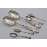 FOUR GEORGE I HANOVERIAN PATTERN TEA SPOONS with plain rattails (one Britannia standard), most