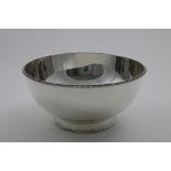 A LATE VICTORIAN HEMISPHERICAL PUNCH BOWL on a collet foot with applied bead borders, by Messrs.