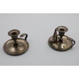 A PAIR OF GEORGE III PLAIN CIRCULAR CHAMBERSTICKS with detachable nozzles and plain moulded borders,