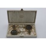 A CASED PAIR OF EARLY 20TH CENTURY NORWEGIAN SILVERGILT AND PLIQUE-A-JOUR SPOONS by J. Tostrup of