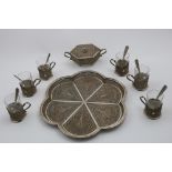 A SET OF SIX MID 20TH CENTURY FILIGREE LEMON TEA GLASS HOLDERS together with six matching spoons,