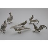 SPANISH NOVELTY TABLE DECORATIONS:- A pair of fighting cocks, two ornamental cock pheasants and a