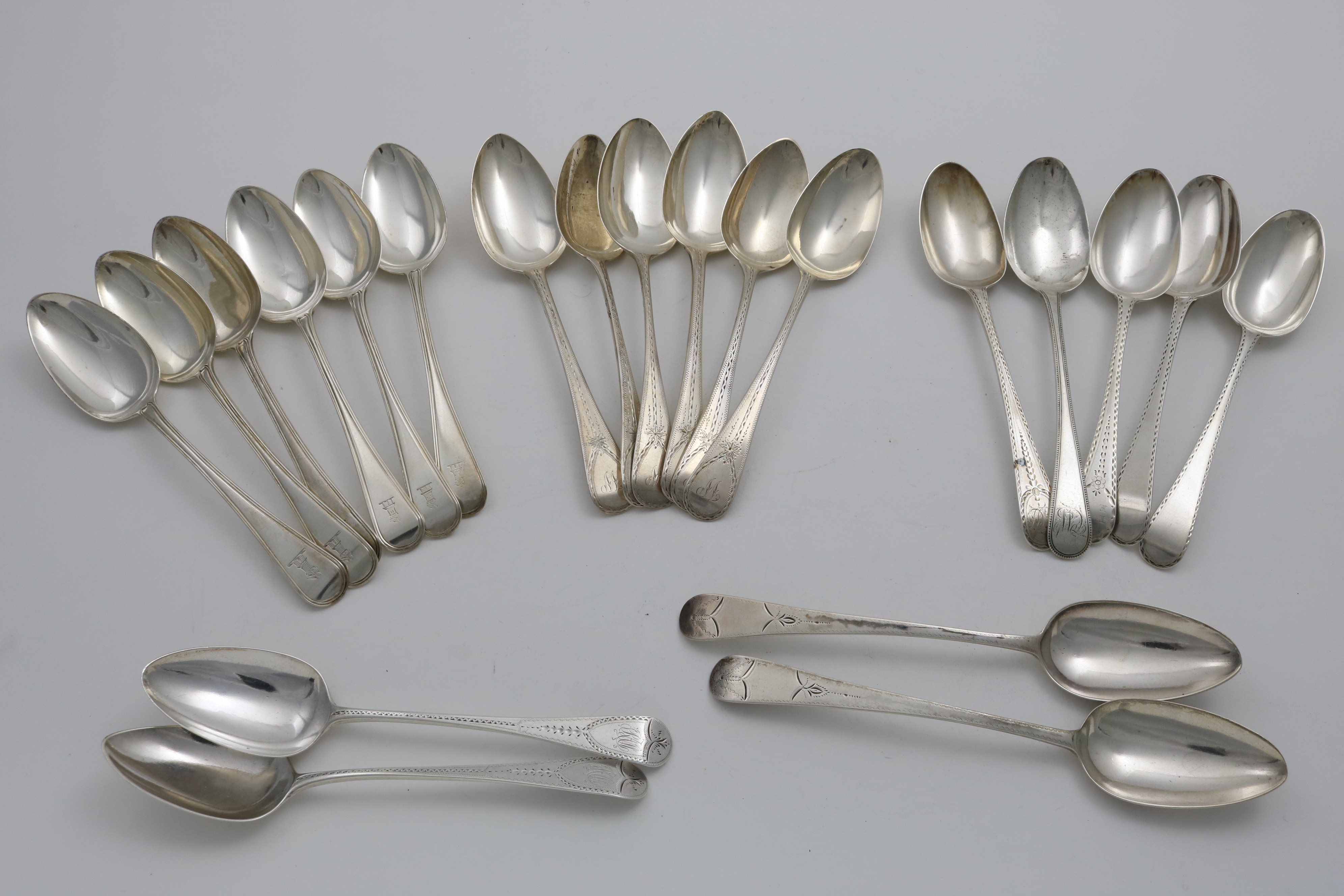 THREE PAIRS OF GEORGE III BRIGHT-CUT TABLE SPOONS Old English pattern (one pair initialled), three