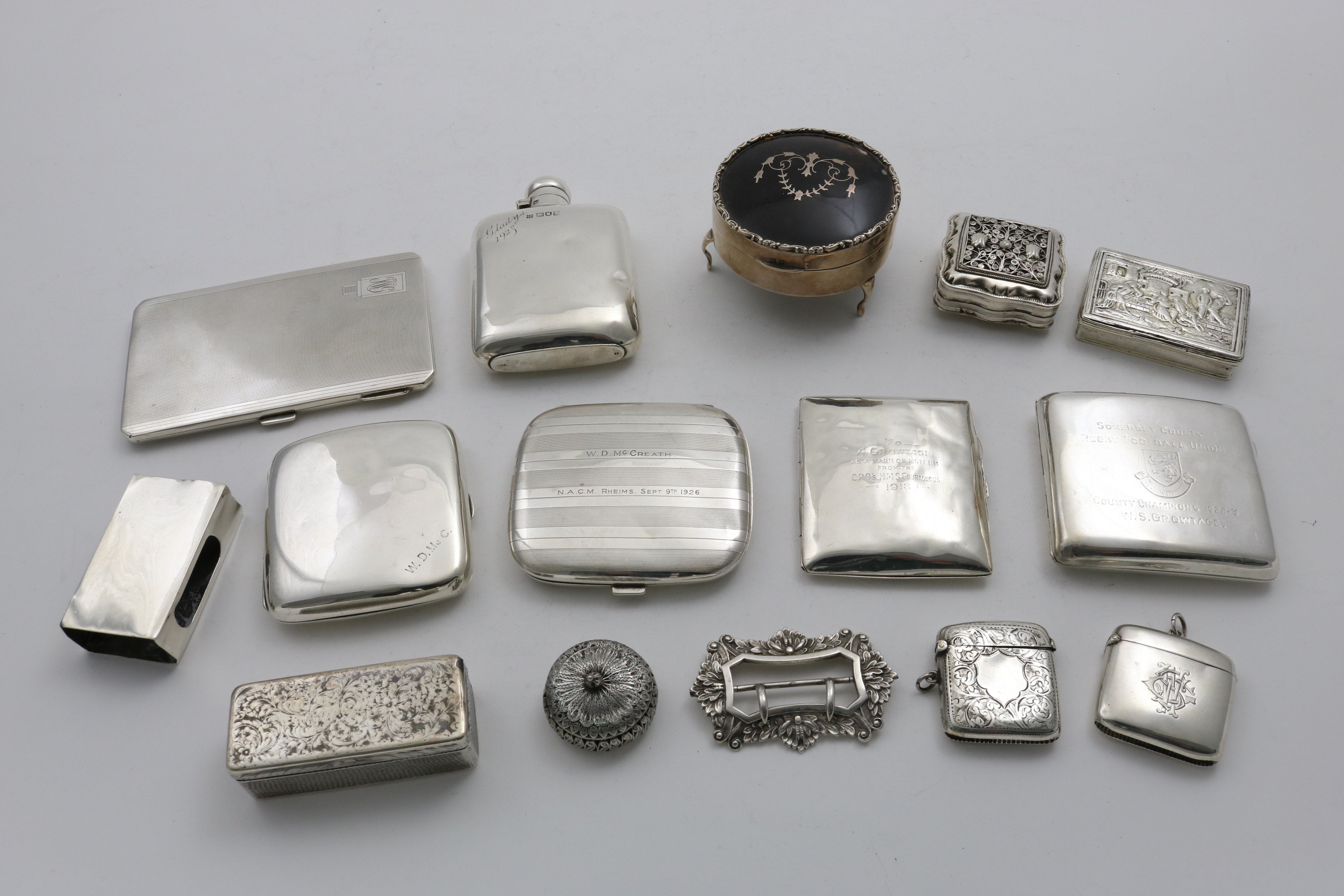 A MIXED LOT:- Five various cigarette cases, each with an inscription/dedication, a spirit flask