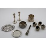 A MIXED LOT:- An Indian small decorative tray, a parasol handle, a small embossed bowl and four