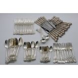 A VICTORIAN CANTEEN OF VICTORIAN PATTERN FLATWARE & CUTLERY TO INCLUDE:- Eleven table spoons, eleven