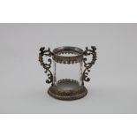 A 19TH CENTURY MOUNTED ROCK CRYSTAL CUP with a cylindrical body, twin caryatid scroll handles and an