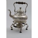 AN EARLY GEORGE I KETTLE-ON-STAND with detachable burner, squat circular form with a mounted