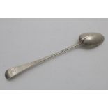 A QUEEN ANNE HANOVERIAN PATTERN BASTING OR SERVING SPOON with a plain moulded rattail, crested on