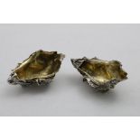 A PAIR OF CONTEMPORARY CAST NATURALISTIC SALTS modelled as an open oystershell, gilt interior, by