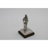 CRICKET:- A contemporary cast figure of "W.G. Grace" in his characteristic pose on a square base