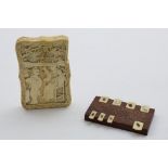 A 19TH CENTURY CHINESE CARVED IVORY CARD CASE with figures on each side (the cover A/F), and an