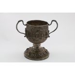 A LATE 19TH CENTURY INDIAN/BURMESE TWO-HANDLED CUP on a large, spreading, detachable foot, decorated