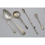 FIVE ITEMS OF FLATWARE:- A handmade cocktail fork with a cast "cherry" terminal, by Amy Sandheim,