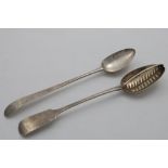 A GEORGE II IRISH BASTING OR SERVING SPOON crested, by Alexander Richards, Dublin 1753 and an